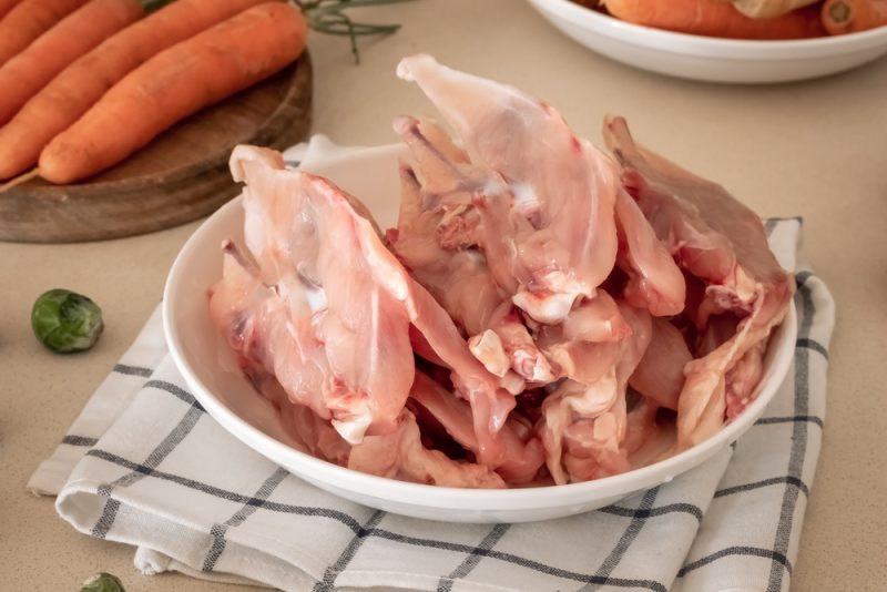 Fresh chicken skeletons and vegetables